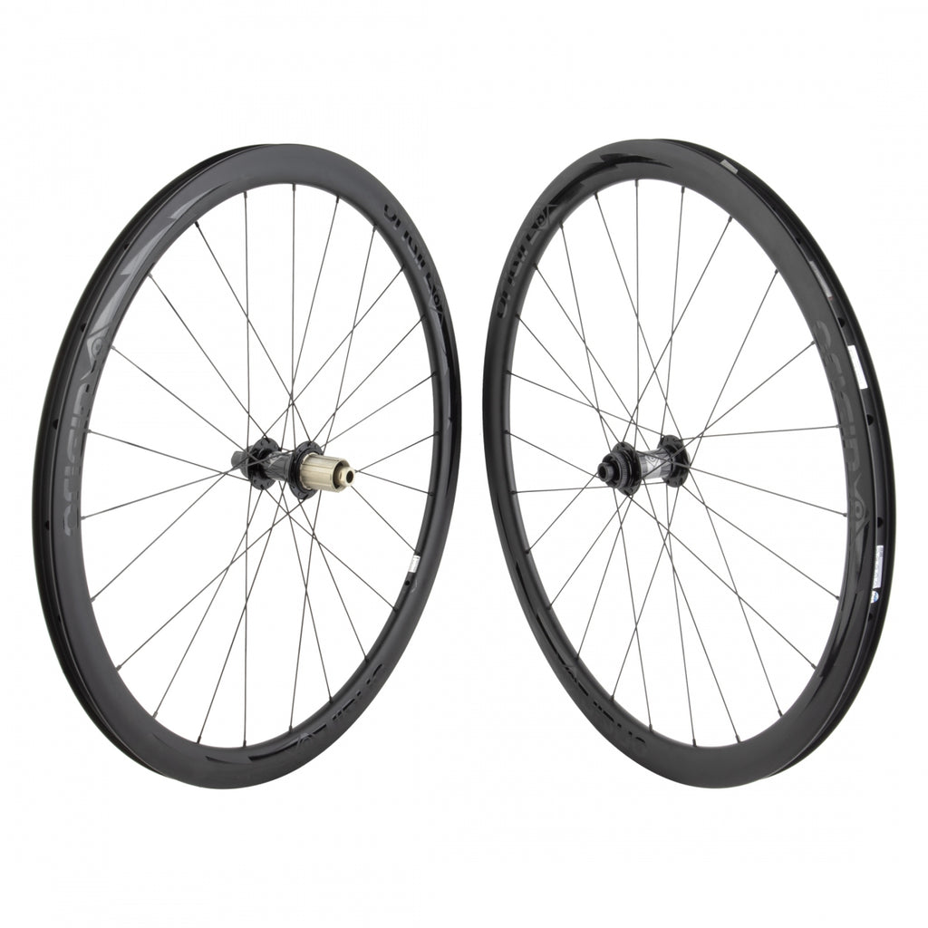 PAIR 700 622x19 ORIGIN 8 BOLT CARBON 38mm TBLS DISC BLACK 24 ORIGIN 8 RD1110 ELITE 8-11sCAS CL 12mm SEAL BLACK 142mm SAPIM RACE 2.0/1.8 BLACK (NO SKEWER)